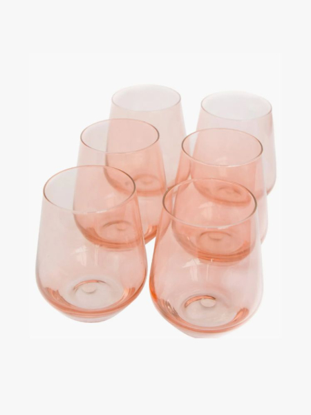 Estelle Colored Glass Stemless Wine Glasses set of six pink stemless wine glasses on light gray background