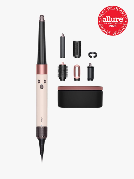 Dyson Airwrap ID MultiStyler and Dryer in branded components on a light gray background with best of beauty seal 2025 on...