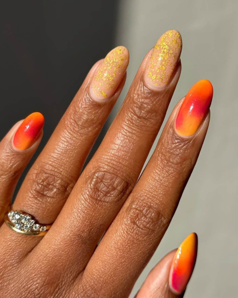 Taylor Swift TLOAS orange and gold aura nails